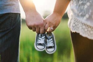 holding-hands-shoes-little-baby